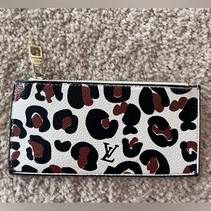 Not real, Louis Vuitton pouch with zipper